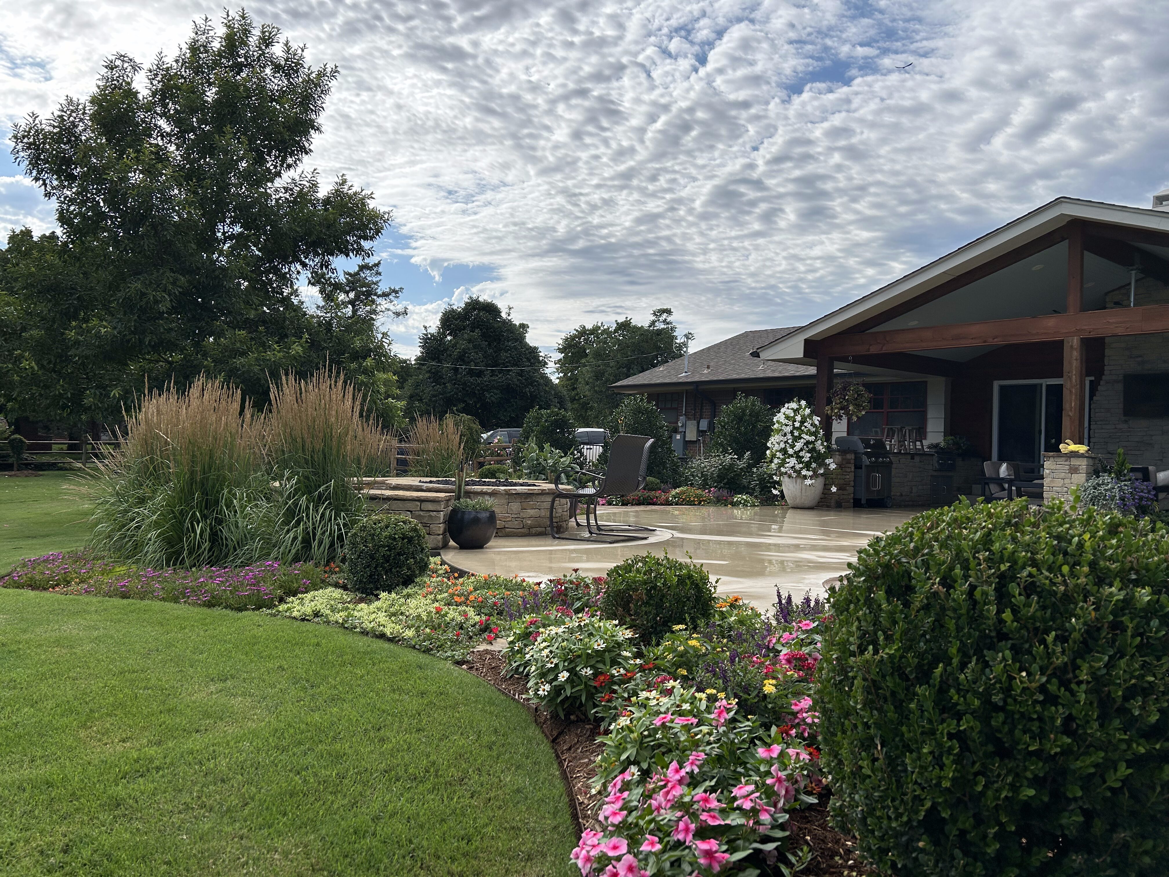 Backyard with firepit seating and outdoor living space