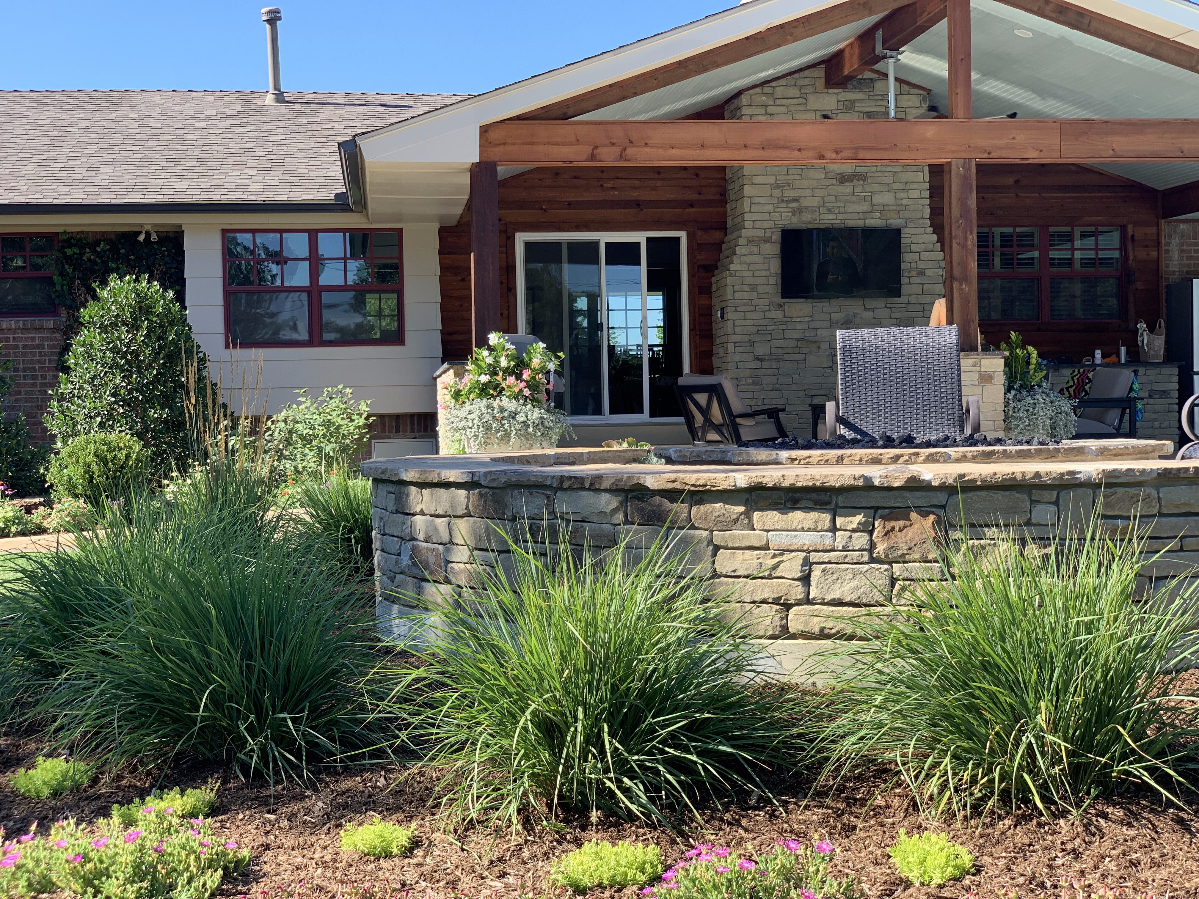 Outdoor living space and seating area with Edmond plants