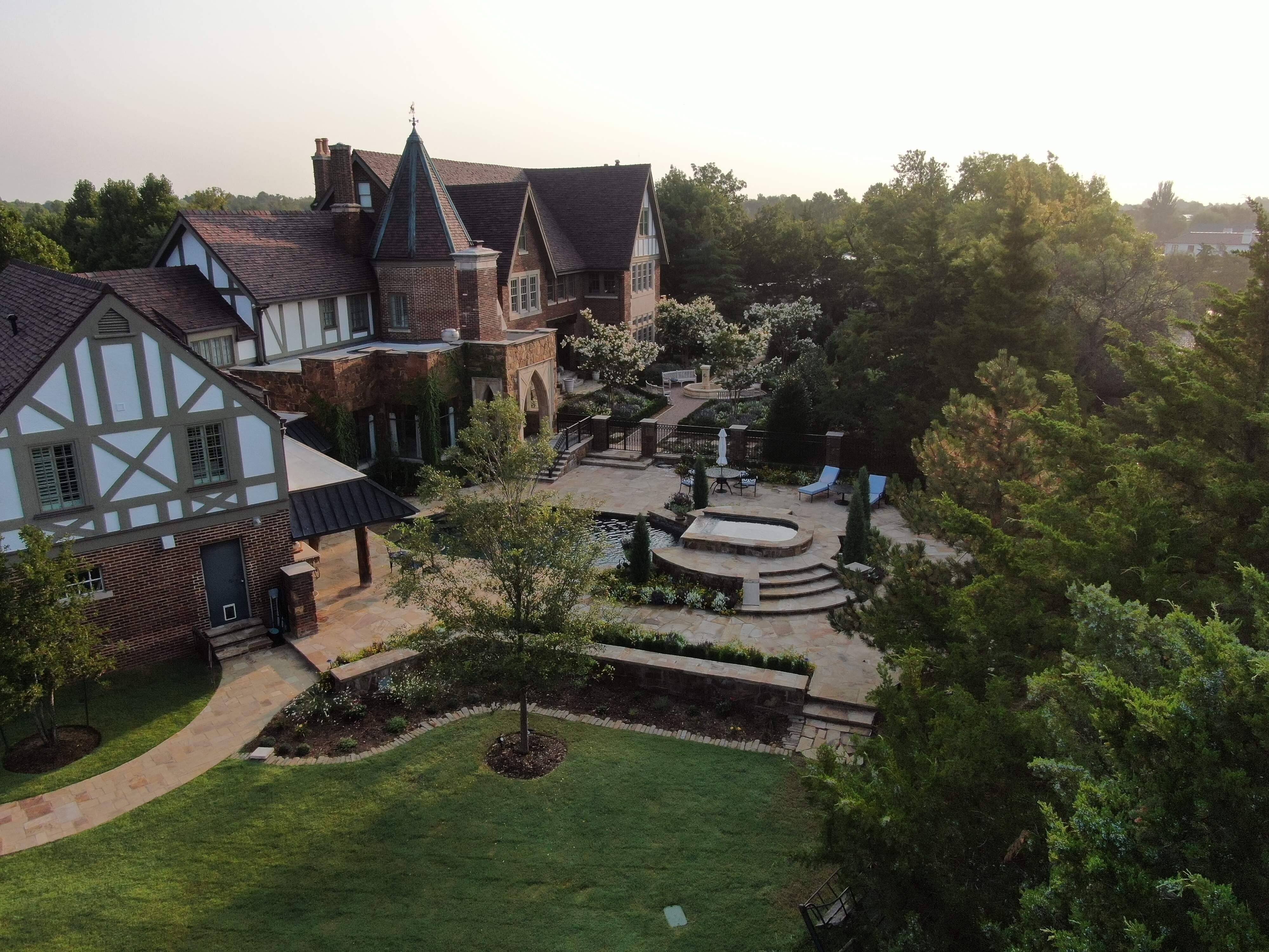Full view of Nichols Hills backyard landscape design inspired by English gardens