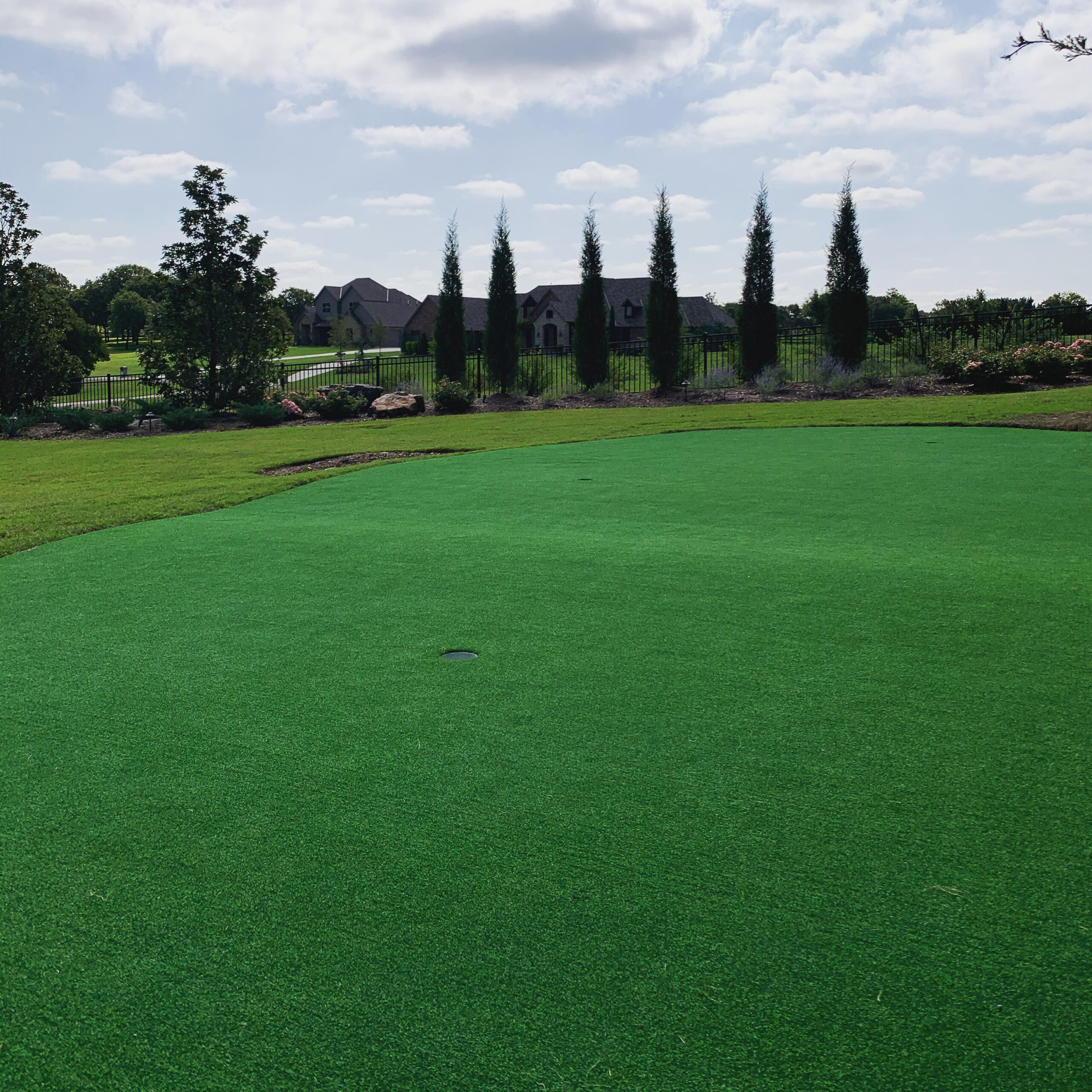 Outdoor Edmond backyard putting green and landscape design