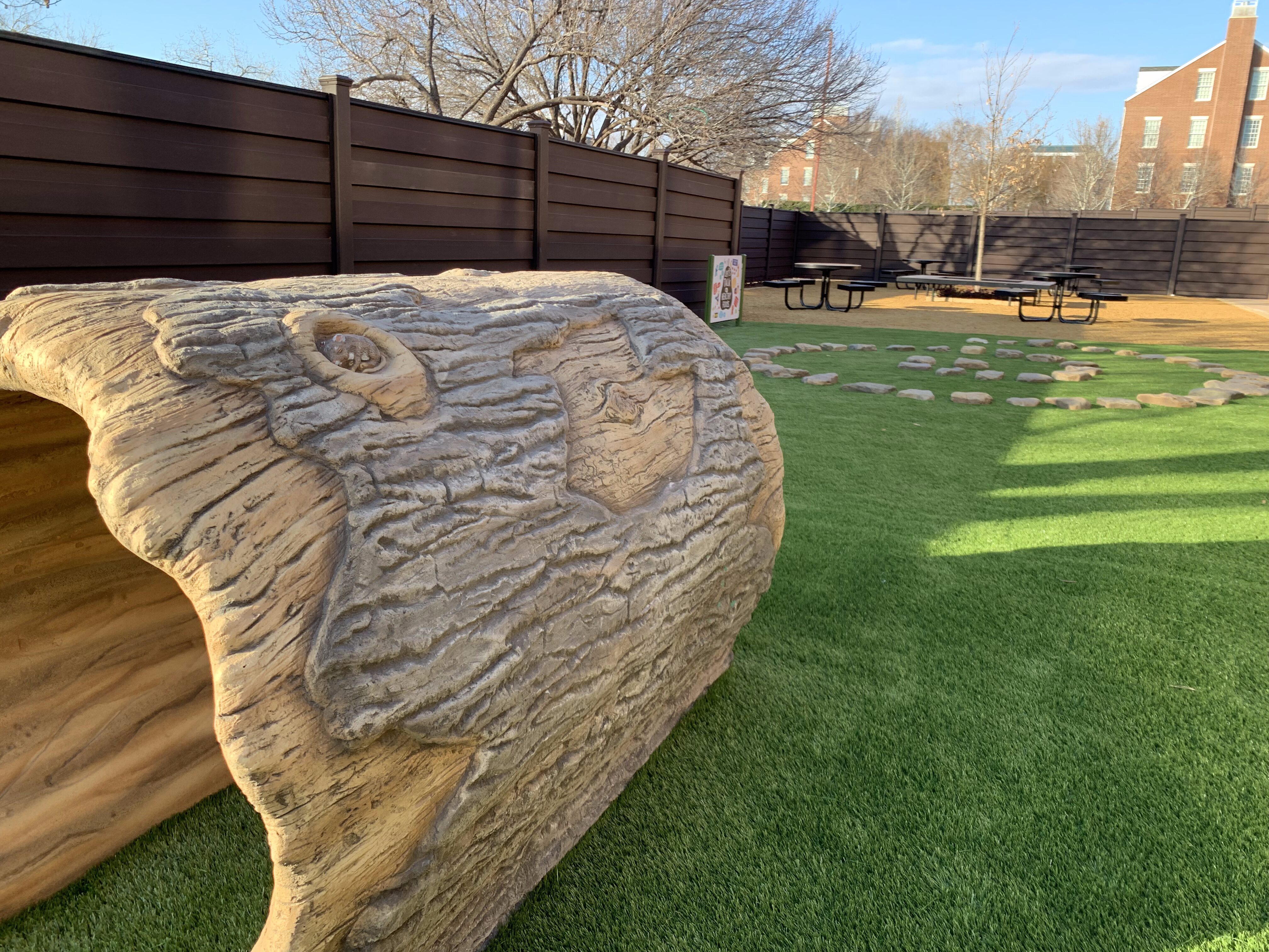 Playground with artificial grass and structures