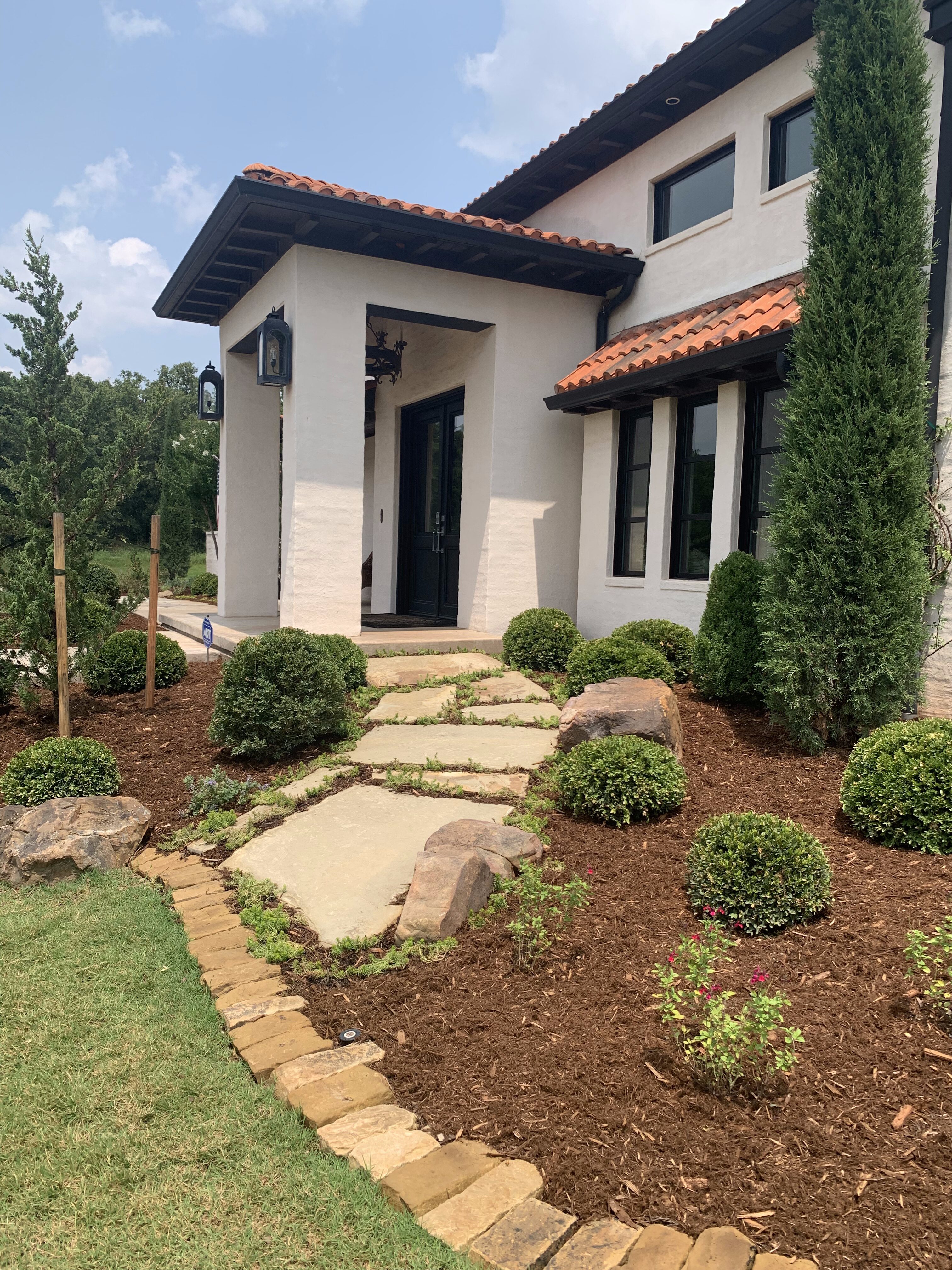 Arcadia front landscape flowerbeds