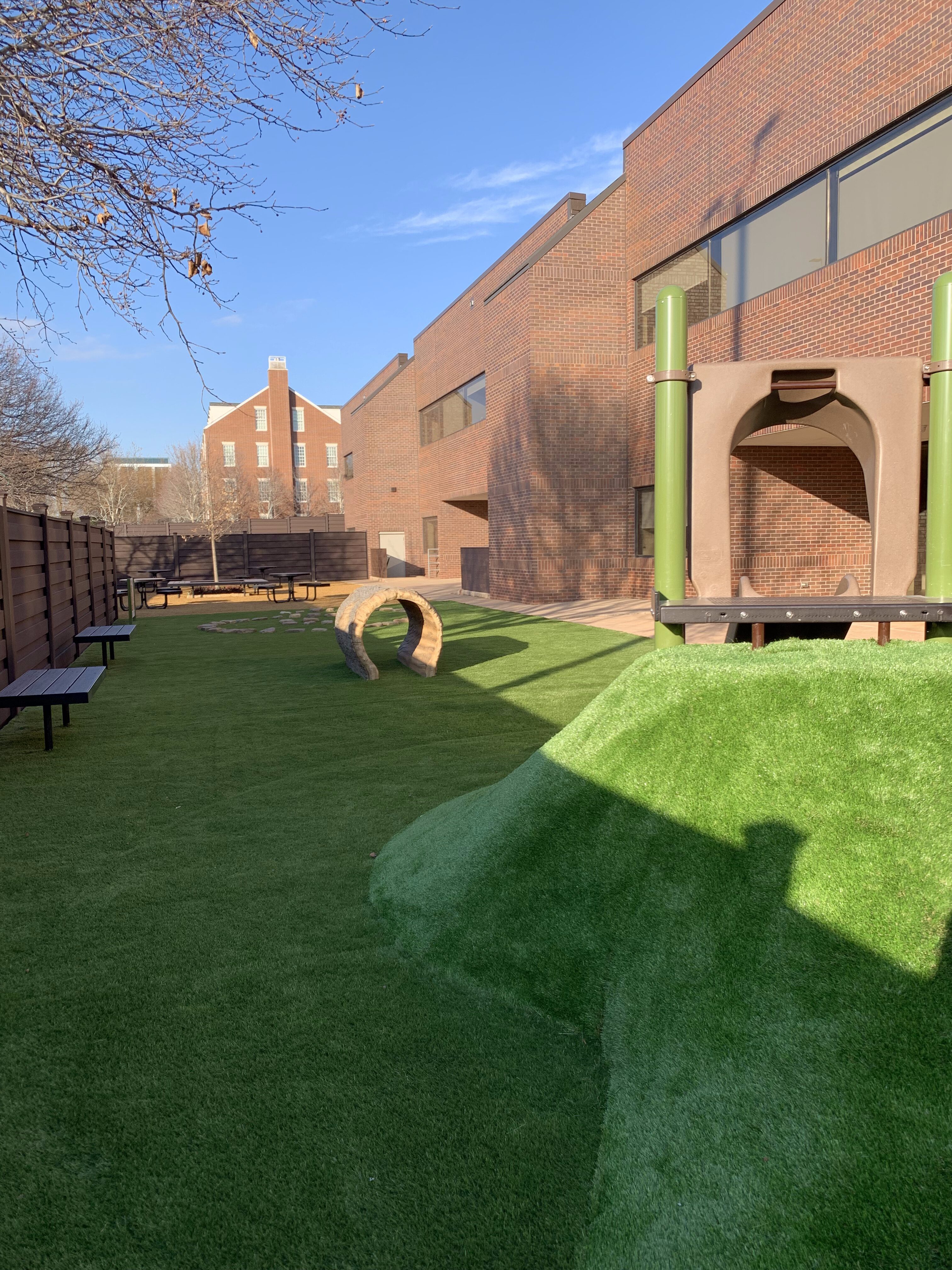 Playground with artificial grass and slide