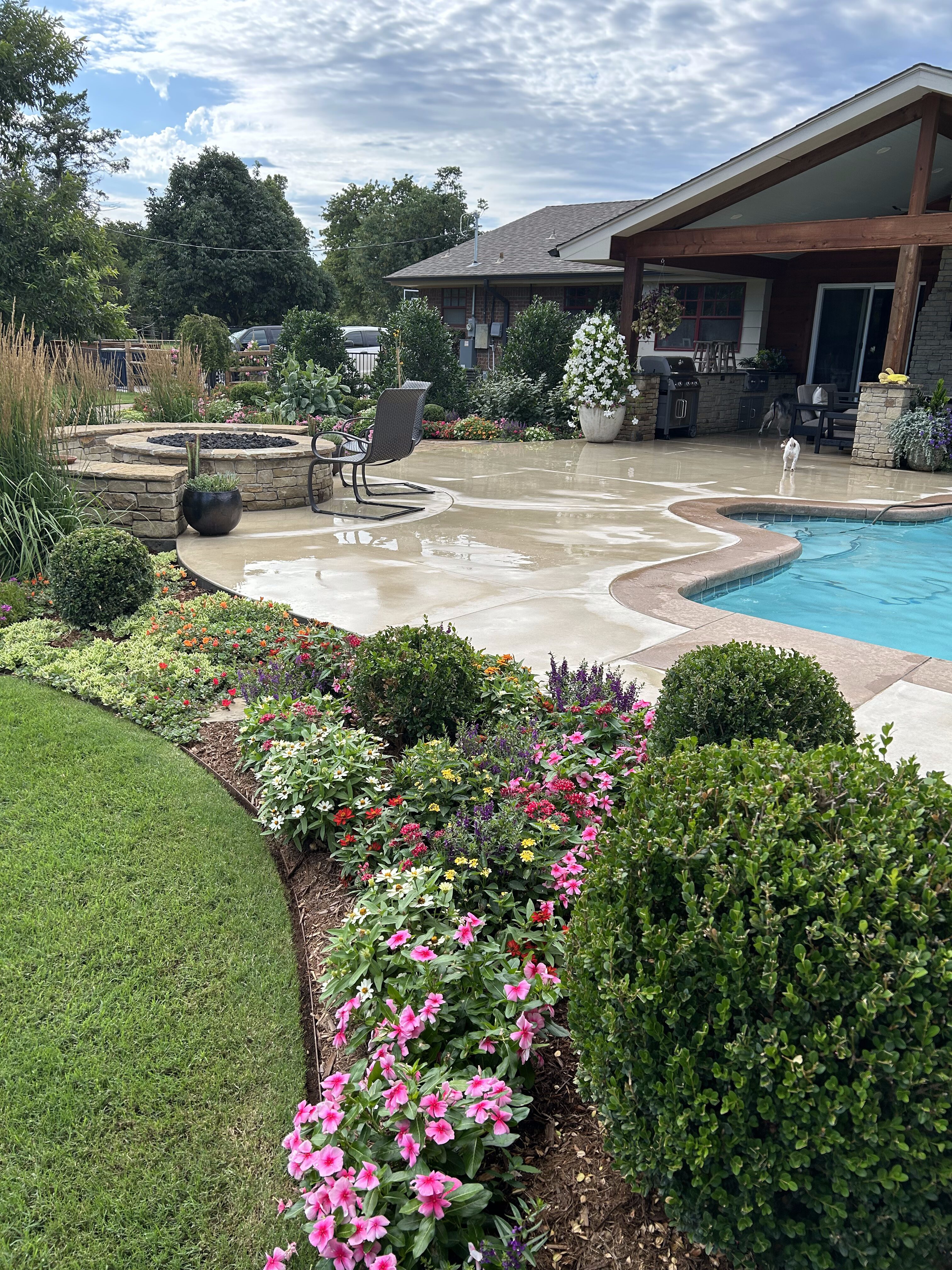 Backyard with pool, firepit seating and outdoor living space