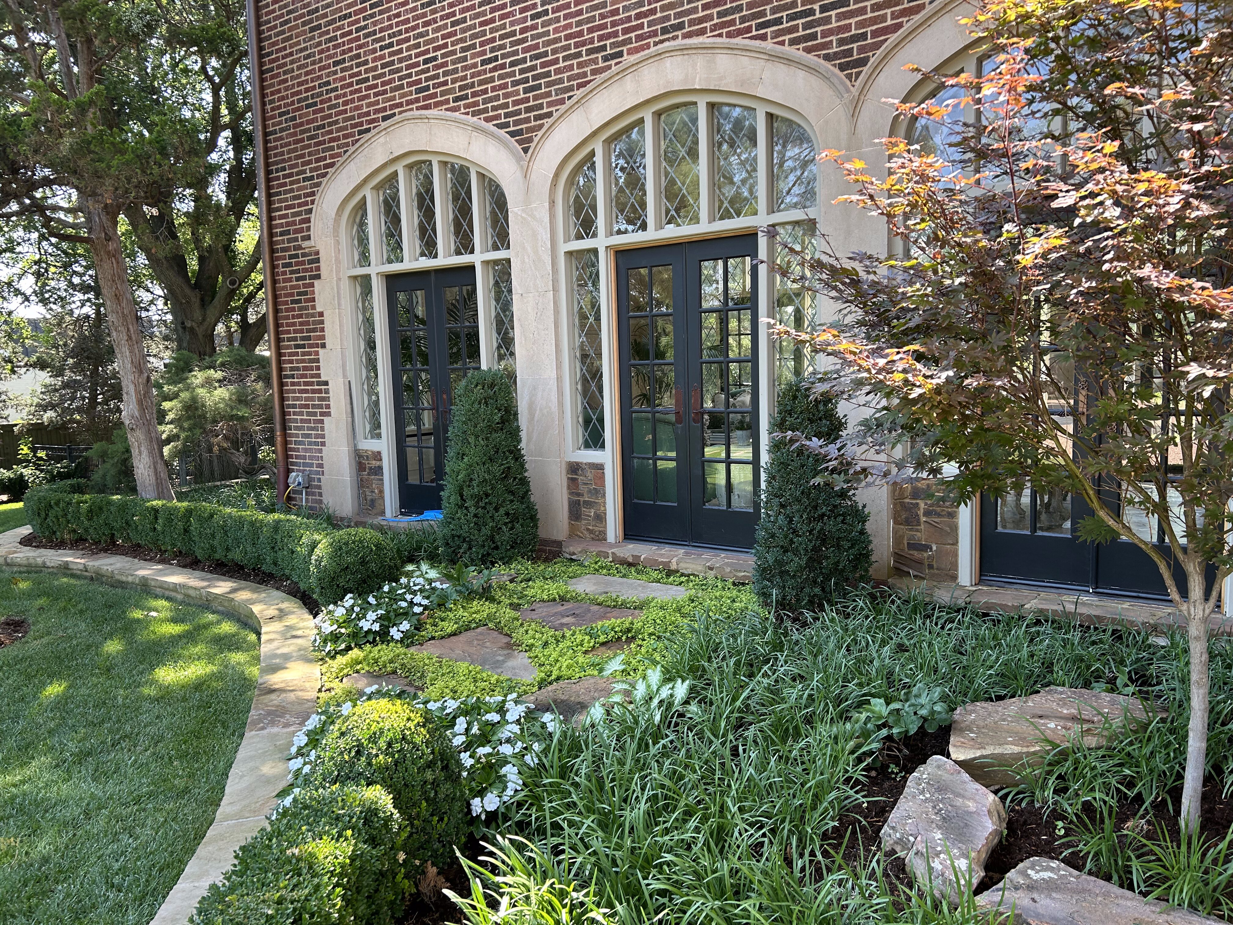 Classic English garden side yard landscaping in Nichols Hills