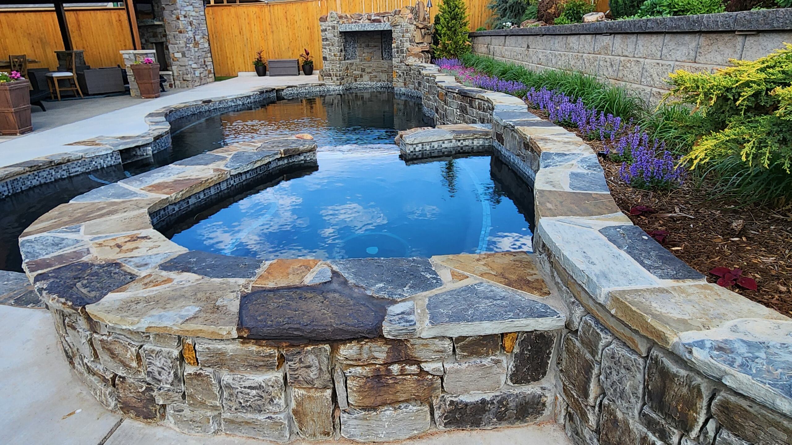 Natural stone pool and landscape design